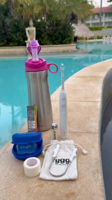 My Travel Essentials!
1. REMplenish water bottle. Habit stacking at its best. A water bottle and a myofunctional tool to optimize tongue strength and your airway health.
2. Sonicare Electric Toothbrush - very effective at removing plaque and the timer keeps you brushing for that full 2 minutes.
3. Floss - it’s not just for reducing your risk of cavities between your teeth. Improved gum health, reduces inflammation in your mouth. Your mouth is the gateway to your body. Reduced inflammation there translates to reduced inflammation in your body. Key to reducing risk of cardiovascular disease and SO many other health complications.
3. Stainless steel tongue scraper - again to reduce bacterial load. Your tongue is an indicator of your Health!
4. Electrolytes - LMNT is my go to. I like the flavours and keeps me hydrated and balanced.
5. AMCOP Bioactivator appliance - this is my favourite myofunctional appliance to guide growth in children. I use it to help with my jaw and to keep my tongue in the right position while sleeping. 
6. Medical paper tape - another favourite to make sure I’m always nasal breathing while sleeping.
7. A great book. Patrick McKeown’s latest book for Sleep. 

Other items I didn’t mention are vitamins. Even in the sun, I brought Vit D3/K2, Magesium and Zinc (a lot better of coughing and flu going around).

What are your travel essentials?!